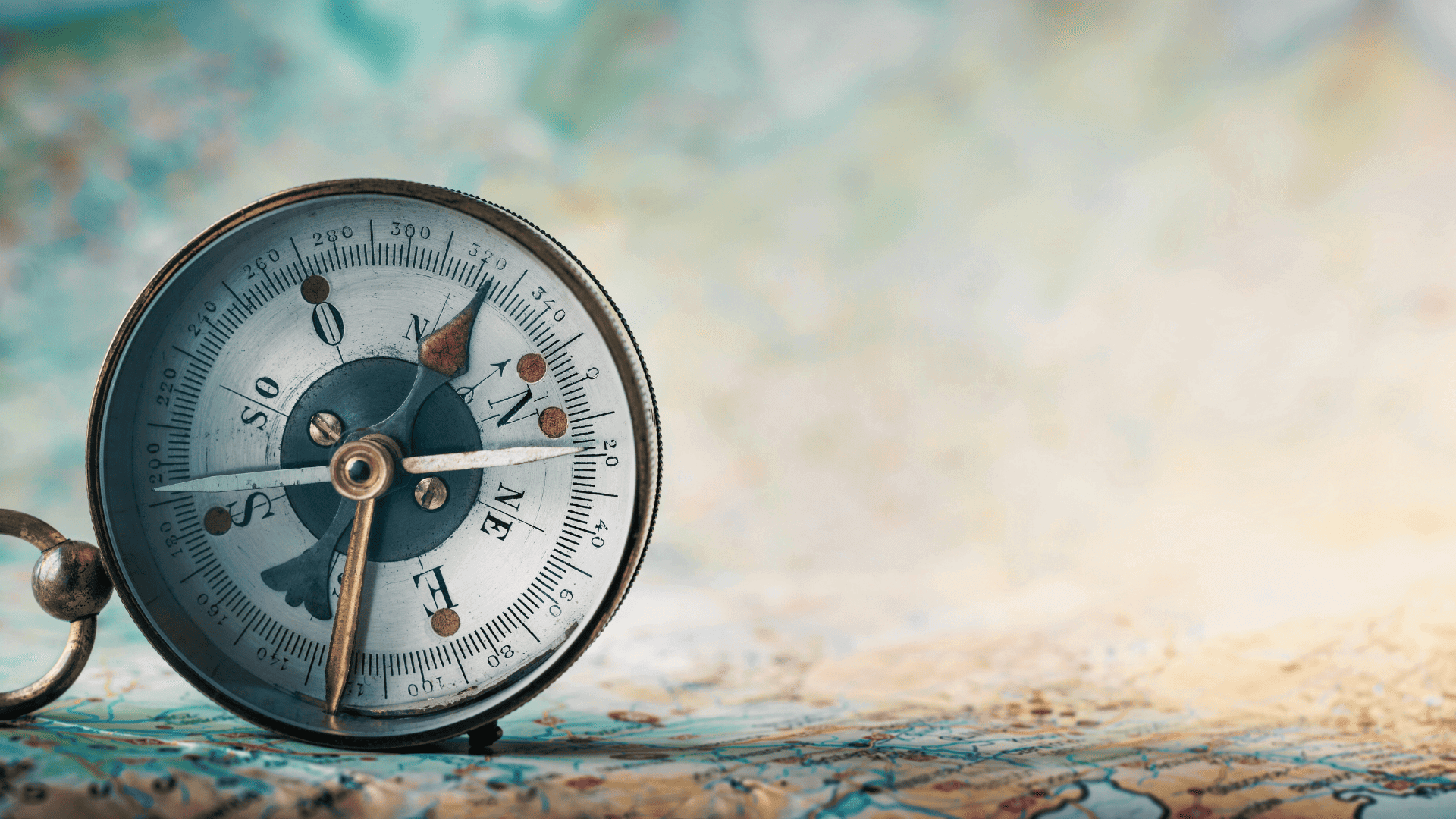 Compass on a map with a vintage style.