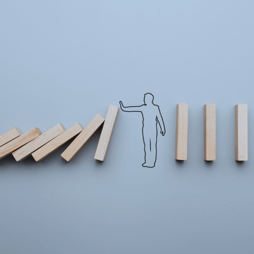 Person stopping blocks from falling